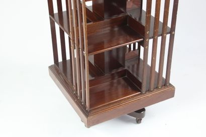 Revolving bookcase in natural wood. 
English...