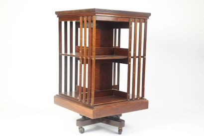 Revolving bookcase in natural wood. 
English...
