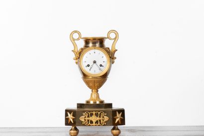 Gilt bronze cassolette clock, resting on...