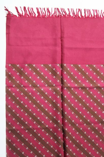 HERMES.
Scarf in burgundy silk with monograms....