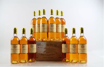 12 bouteilles de SAUTERNES 1999 du Château...