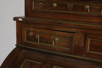 Mahogany-veneered cylinder desk, opening...