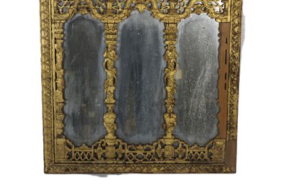 Framed mirror, carved and gilded wood imitating...