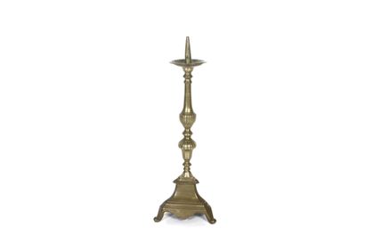 Gilt bronze candle pick with carved decoration....