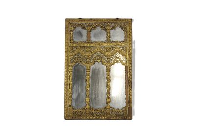 Framed mirror, carved and gilded wood imitating...