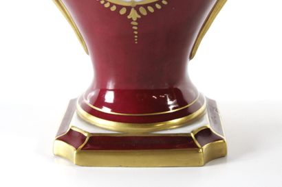 Pair of baluster vases in red and gold enameled...