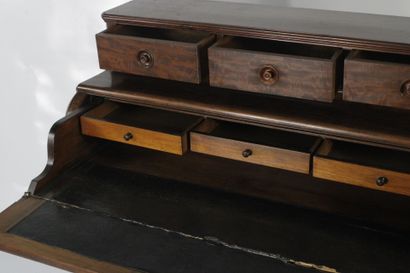 Mahogany veneered stepped desk opening with...