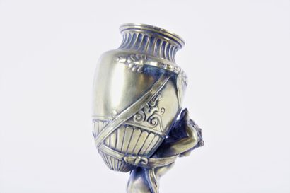 Water-carrying putto in chased and gilded...