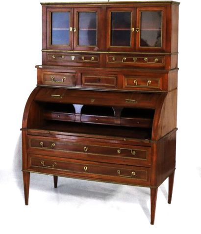 Mahogany-veneered cylinder desk, opening...