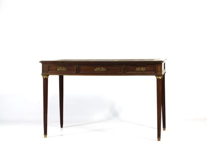 Flat mahogany desk opening with three drawers...