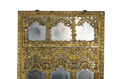 Framed mirror, carved and gilded wood imitating...