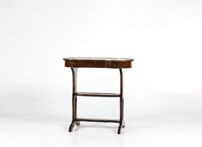 Oak kidney-shaped table opening with two...