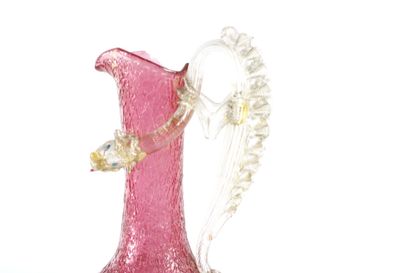 MURANO, attribué à
Verseuse en verre soufflé...