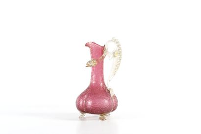 MURANO, attribué à
Verseuse en verre soufflé...