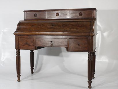 Mahogany veneered stepped desk opening with...