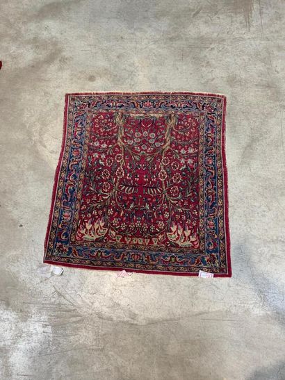 Kirman carpet,
Garnet field with original...