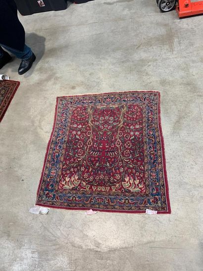 Kirman carpet,
Garnet field with original...