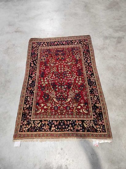 Fine old Isfahan carpet with earthly paradise...