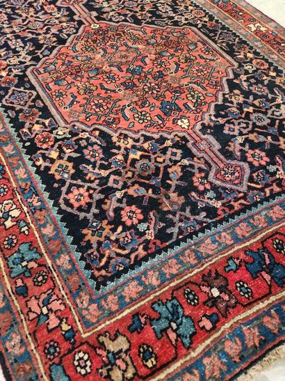 Old Bidjar
Midnight-blue Herati field decorated...