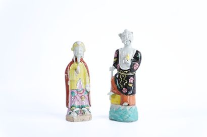CHINA. 
Pair of polychrome porcelain statuettes....