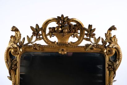 Large rectangular beveled mirror with carved...