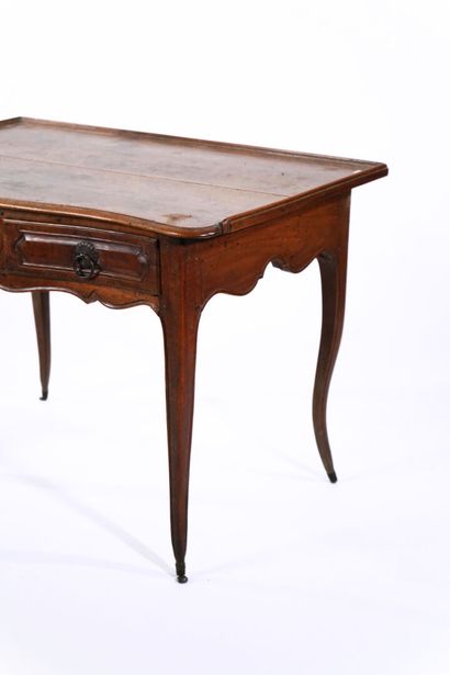 Natural wood writing table opening with two...