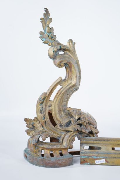 Chased and gilt bronze andirons decorated...