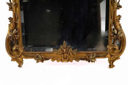 Large rectangular beveled mirror with carved...