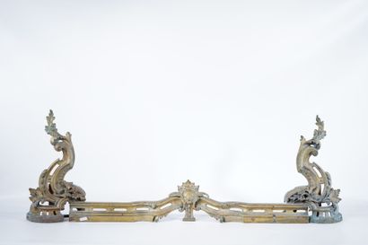Chased and gilt bronze andirons decorated...