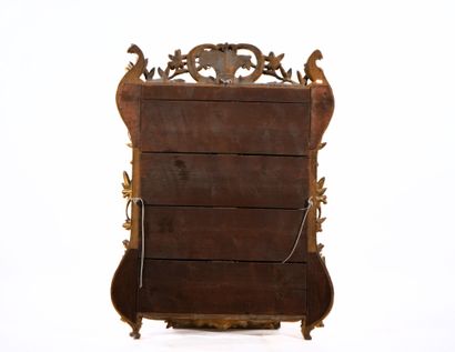 Large rectangular beveled mirror with carved...