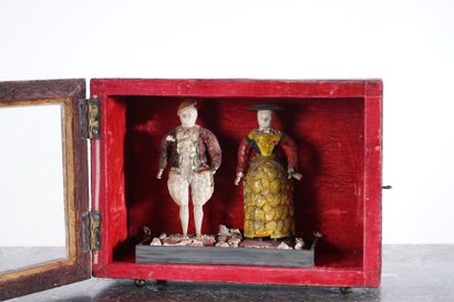 Small curiosity box, two figures dressed...