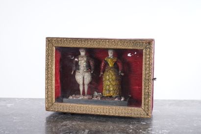 Small curiosity box, two figures dressed...