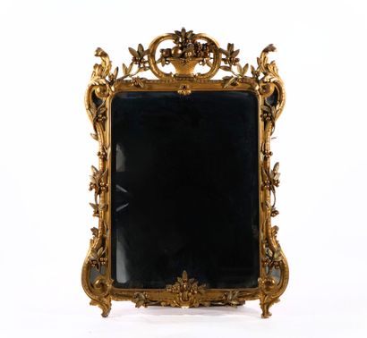 Large rectangular beveled mirror with carved...