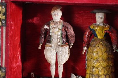 Small curiosity box, two figures dressed...