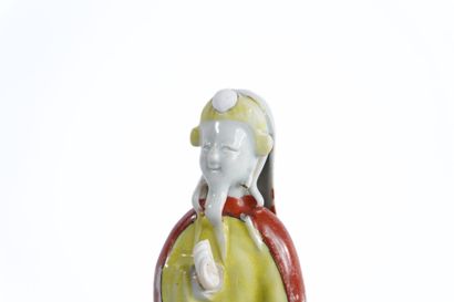 CHINA. 
Pair of polychrome porcelain statuettes....