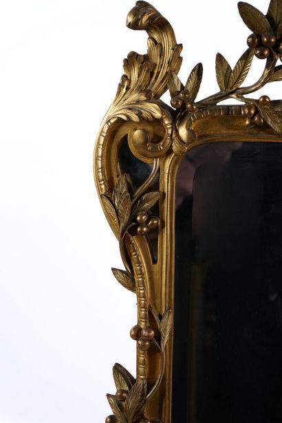 Large rectangular beveled mirror with carved...