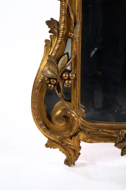 Large rectangular beveled mirror with carved...