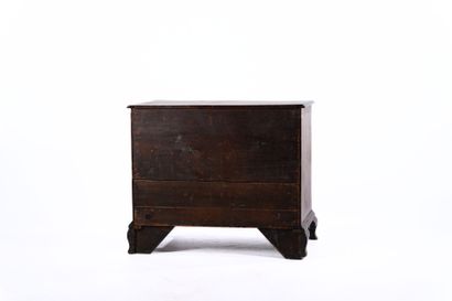 Wood veneer chest of drawers opening in front...