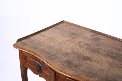 Natural wood writing table opening with two...