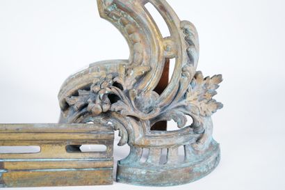 Chased and gilt bronze andirons decorated...