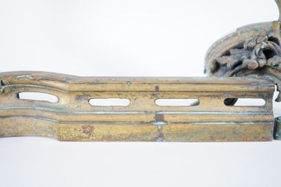 Chased and gilt bronze andirons decorated...