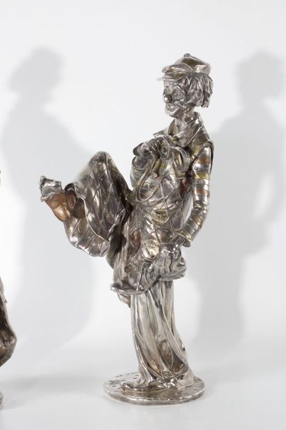 Paire de clowns en argent, métal argenté...