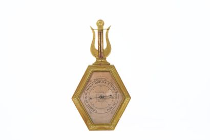 Baromètre en bois et stuc doré à décor de...