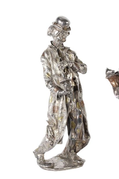 Paire de clowns en argent, métal argenté...