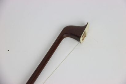 Study violin in its case. A bow is attached...