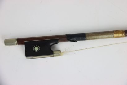 Study violin in its case. A bow is attached...