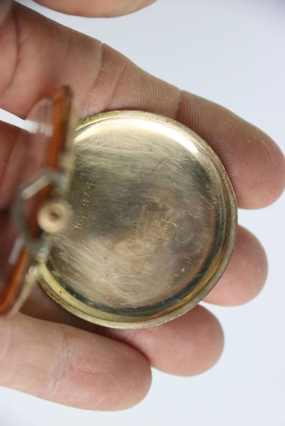Gold plated metal pocket watch with breguet...