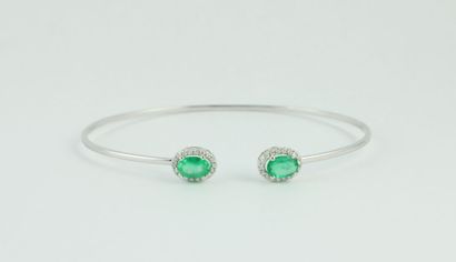Bracelet jonc en or gris 18K (750/1000) orné...