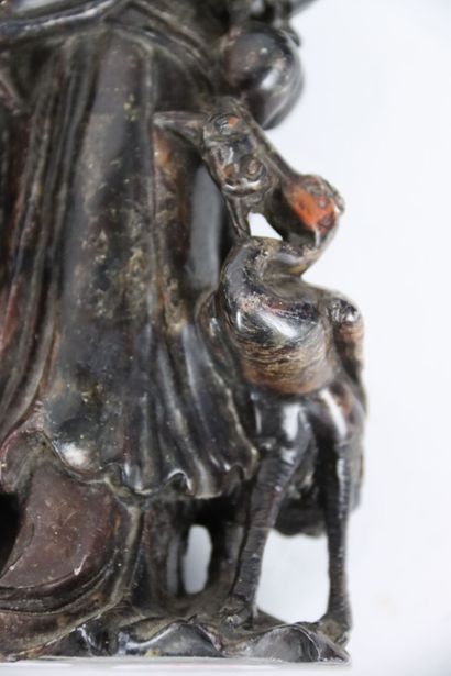 CHINA, statuette of Guanyin in hard stone....
