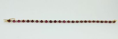 Bracelet en or jaune 18K (750/1000) orné...